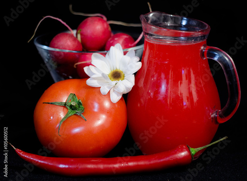 red juices in glasses and fruits and vegetbles photo