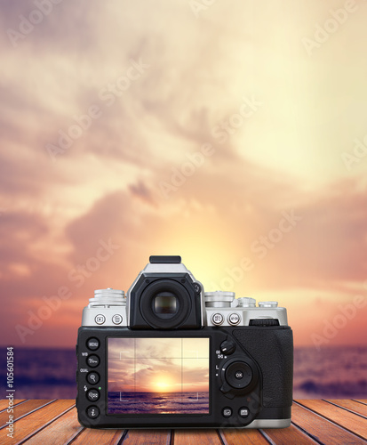 digital camera, take a photo of the summer, beautiful sunset [blur and select focus background]