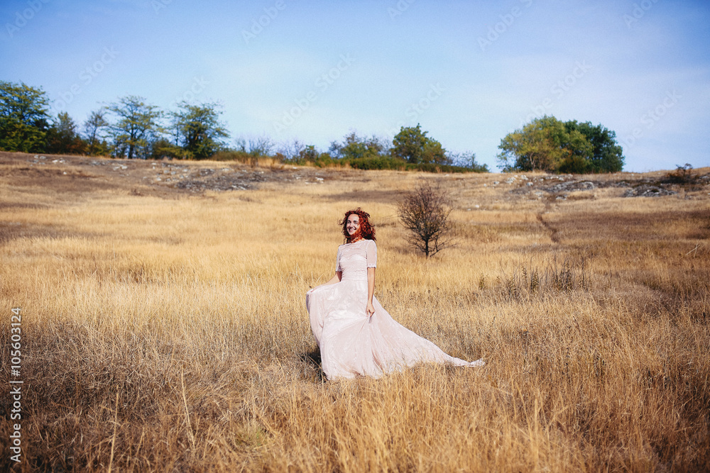 Bride is walking to his groom in the steppe