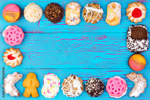 Frame of colorful assorted cookies or biscuits photo