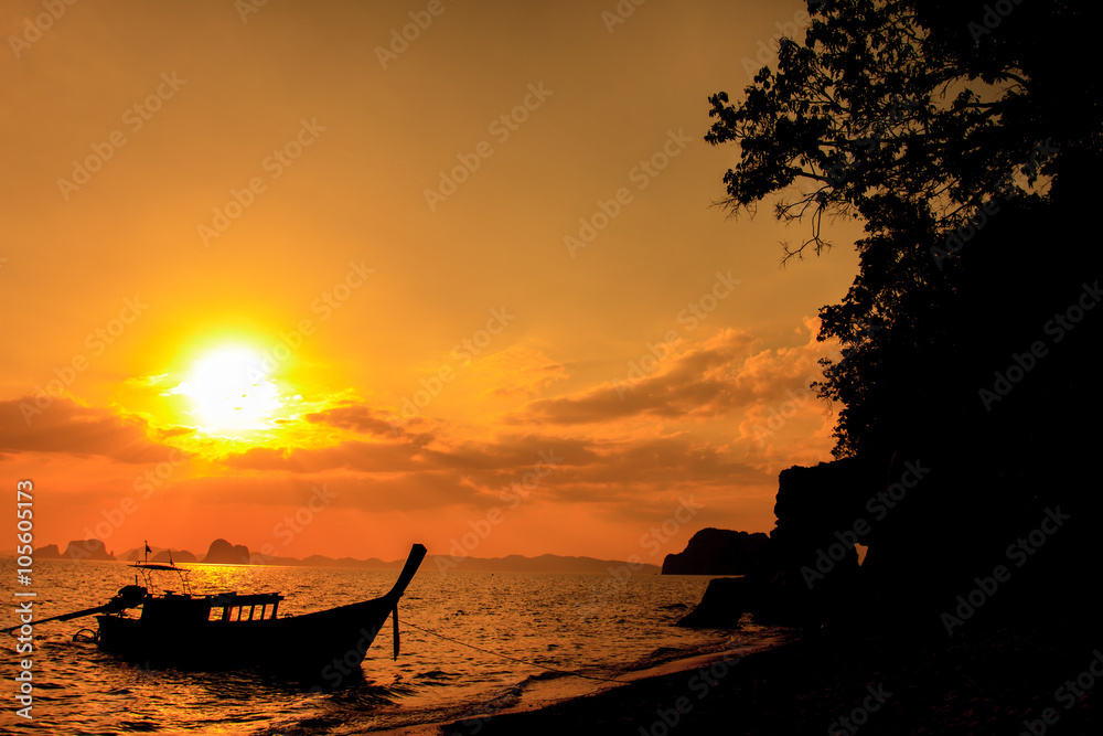 Longtail boat on sunrise