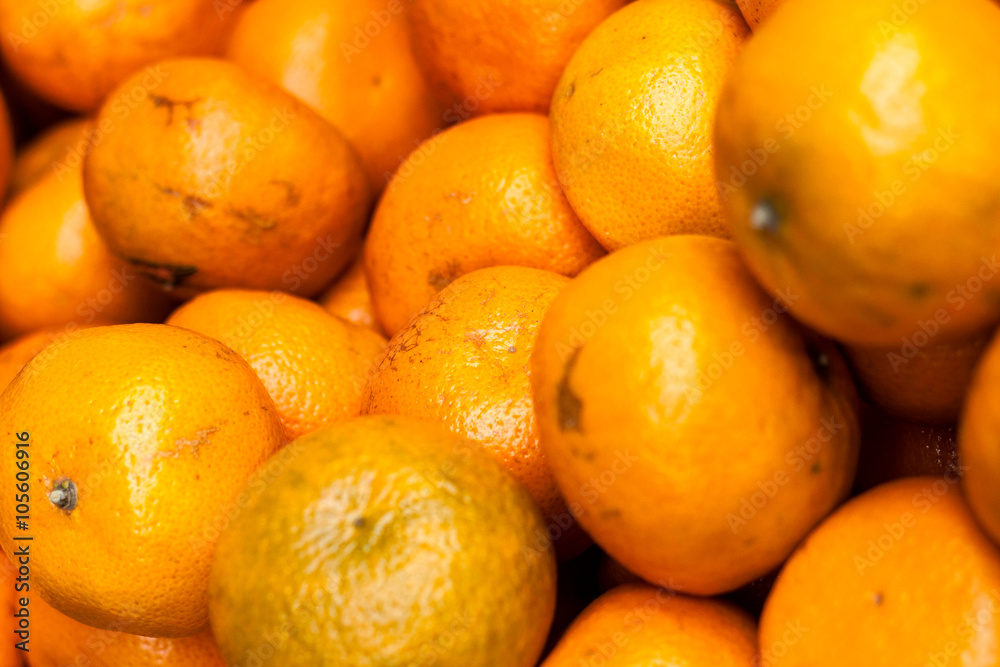 A lot of juicy mandarin oranges. Bunch of fruits. Vivid colours. A lot of juicy mandarin oranges. Bunch of fruits. Vivid colours.