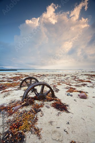 Rusty wheels in the sand