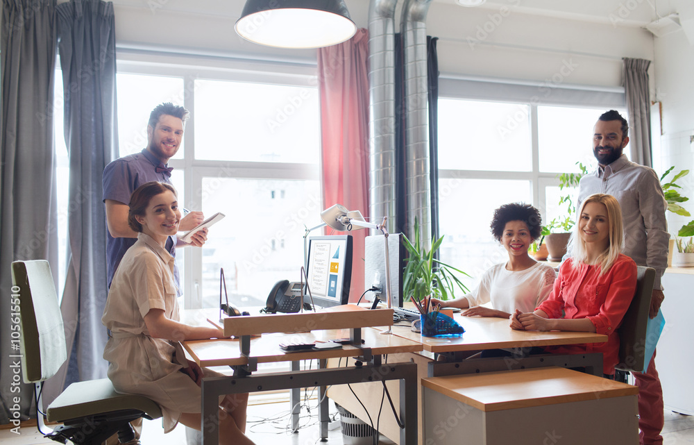happy creative team in office happy creative team in office