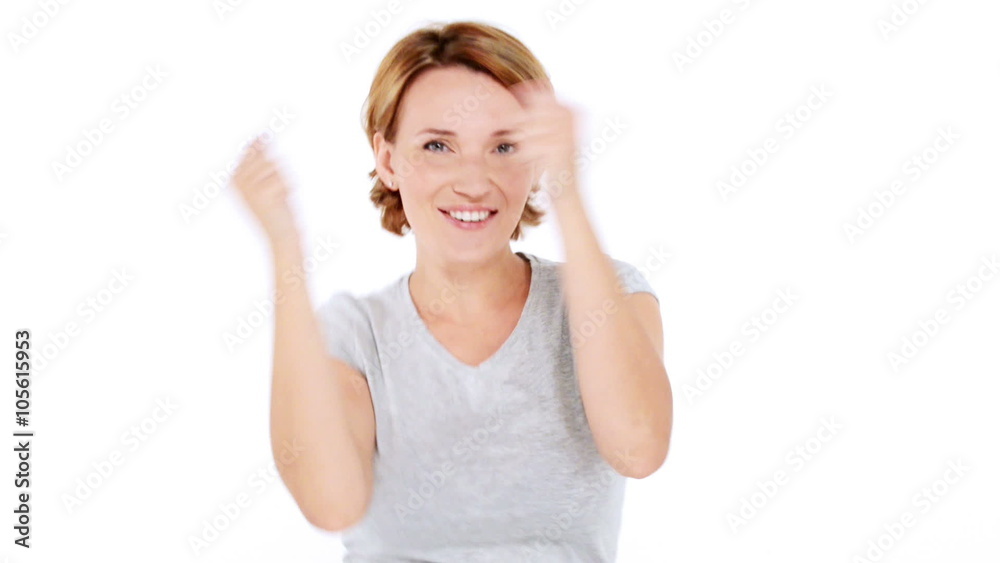 Beautiful happy surprised woman with positive emotions over white background Beautiful happy surprised woman with positive emotions over white background