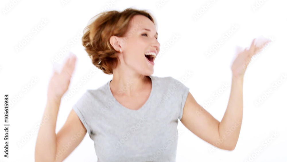Beautiful happy surprised woman with positive emotions over white background Beautiful happy surprised woman with positive emotions over white background