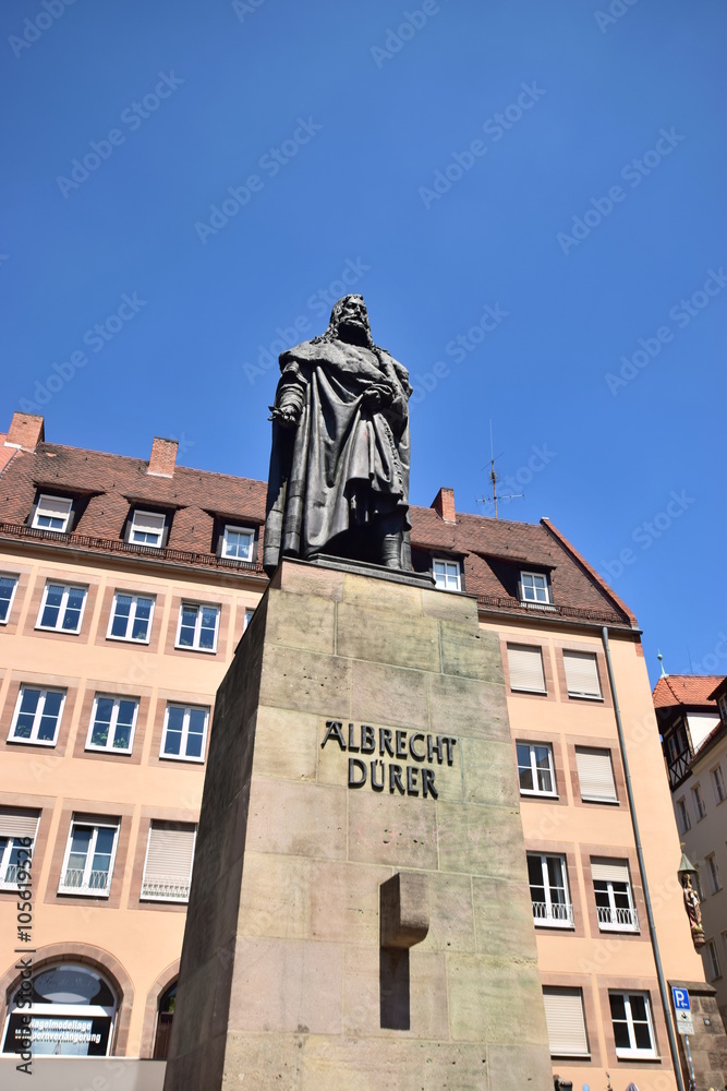 Obraz premium Monument to the Renaissance artist Albrecht Dürer in the city of Nuremberg, Bavaria, Germany