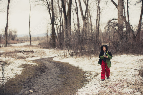 Boy standing next to trail. © hmphoto06