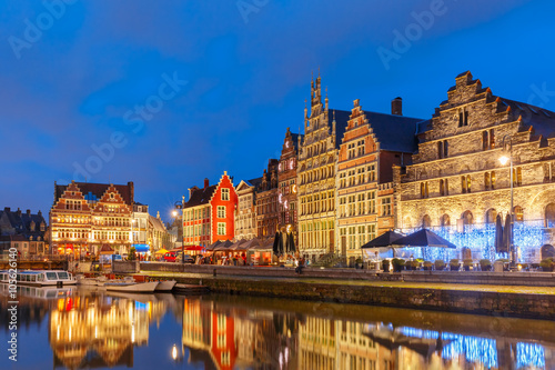 Picturesque medieval buildings on the quay Graslei in Leie river at Ghent town at morning, Belgium