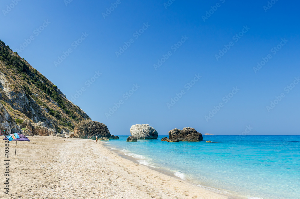 Wild beach of Megali Petra. A beautiful beach with large rocks in the water. Megali Petra Beach, Lefkada Island, Levkas, Lefkas, Ionian sea,