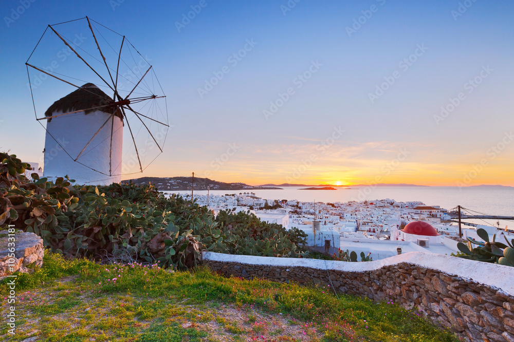 Traditional windmill over the town of Mykonos, Greece.