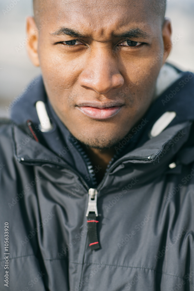 Portrait of a Young Black Man in the Street