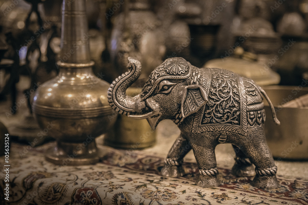 Obraz premium Detailed close-up elephant figurine made of metal. 