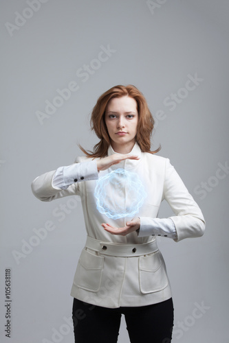 Woman with glowing magical energy ball.