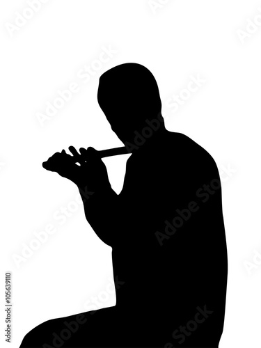 Silhouette playing a flute