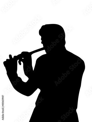 Silhouette playing a flute