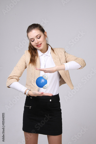 Young woman scientist with model of water molecule. © Vasily Merkushev