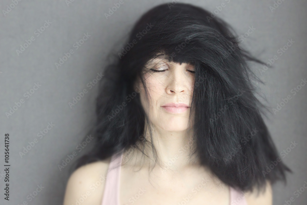 woman with tousled hair dry