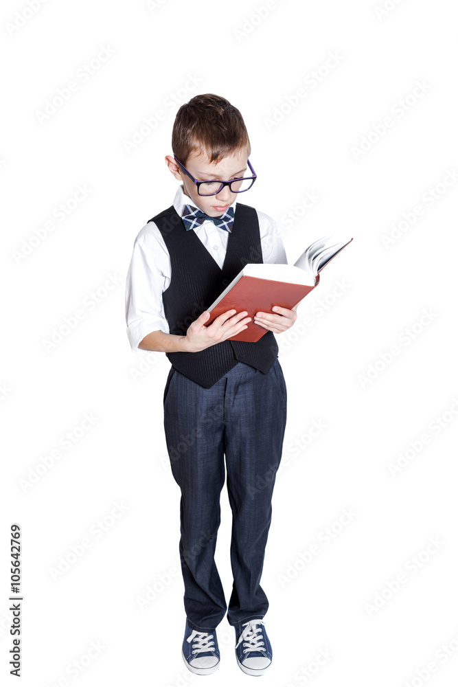 Schoolboy with book isolated on white background