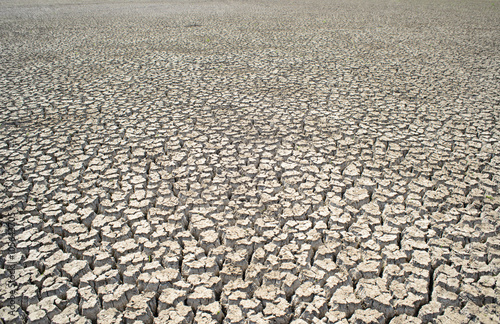  Cracked ground. Dry land. Desert landscape background. Global warming concept