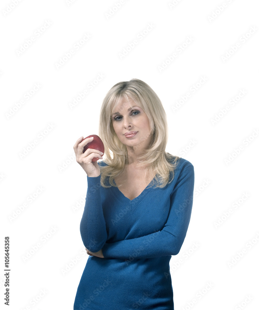 Caucasian woman holding apple Caucasian woman holding apple