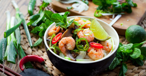 prawn noodles -  spicy asian meal with mushrooms, chili, mint and lime - bún gạo với tôm
