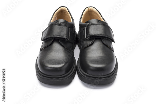 Boys black school shoe on a white background