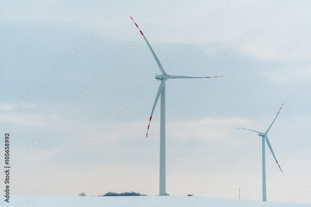Windmill on the field in winter Windmill on the field in winter