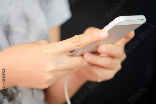 Close up of young woman using a smartphone,Social Media Life