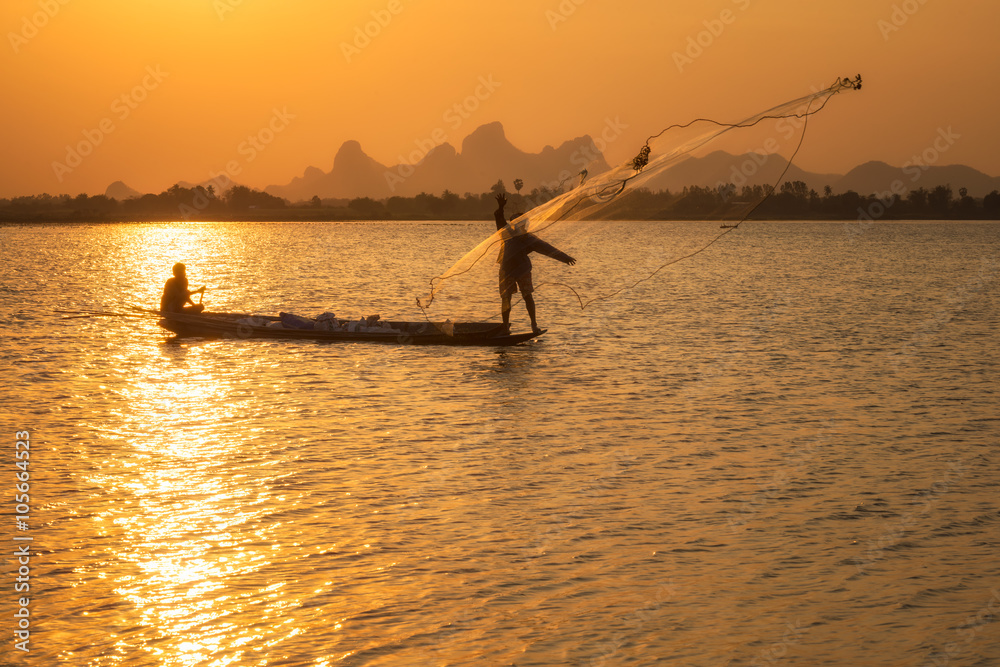 Silhouette of a fisherman