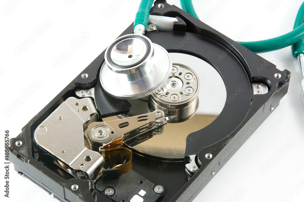 hard disk with a sthetoscope isolated on white background hard disk with a sthetoscope isolated on white background