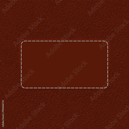 Brown leather background with blank label