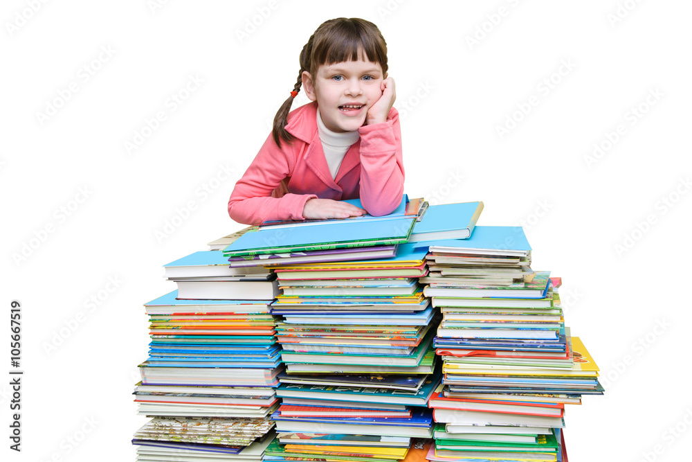 Girl in jacket leaning on a high stack of books Girl in jacket leaning on a high stack of books