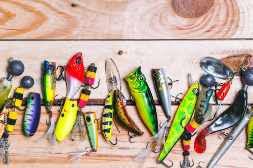Various fisherman's equipment on wooden background