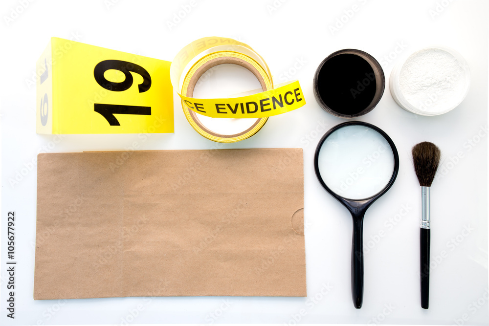 magnifying glass and detection of latent fingerprint tool for forensic and  detective in crime scene Stock Photo | Adobe Stock