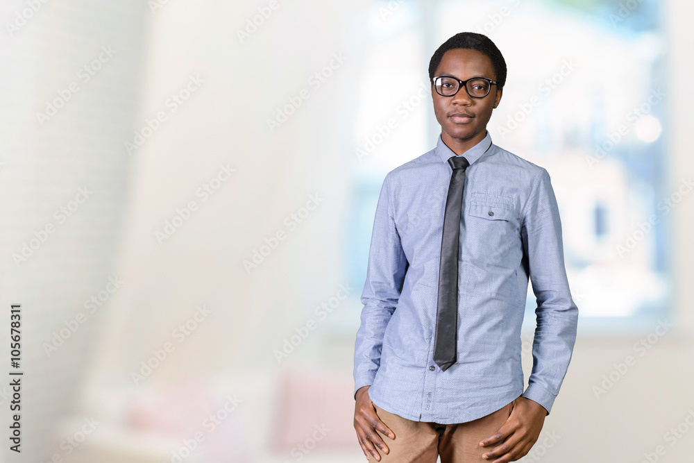 Portrait of happy young african guy with his arms crossed Portrait of happy young african guy with his arms crossed