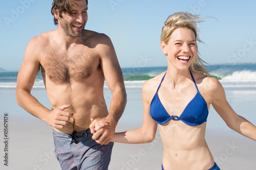Couple running at beach