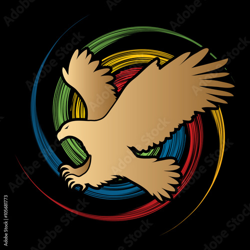 Eagle flying attack designed on spin wheel background graphic vector.