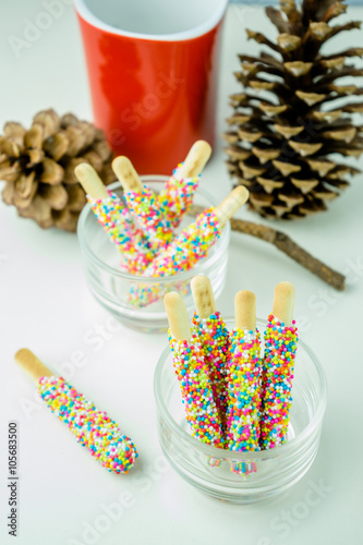 Biscuit stick coated with rainbow