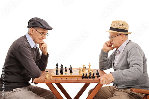 Fotografie Two senior gentlemen playing chess