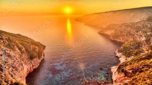 Beautiful full HD HDR timelapse video of a summer sunset of the rocky coast of the island of Zakynthos, Greece.  photo