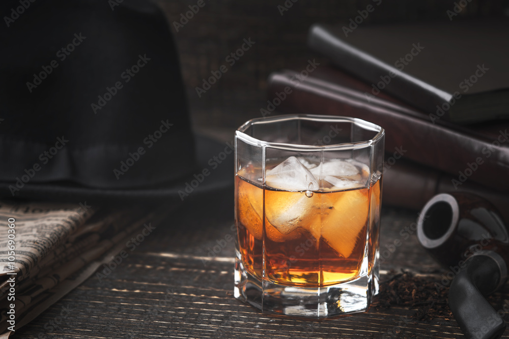Whiskey with pipe , hat and newspaper horizontal Whiskey with pipe , hat and newspaper horizontal