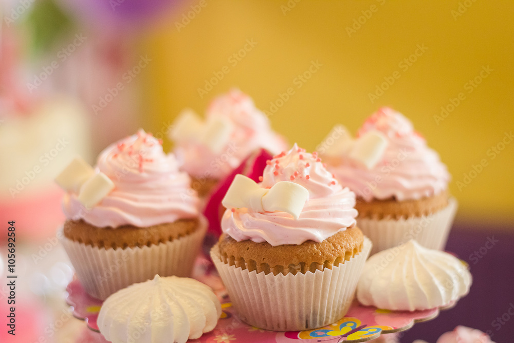 close-up of pink cupcake with icing