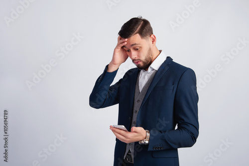 Young manager frustrated by what he saw on the phone