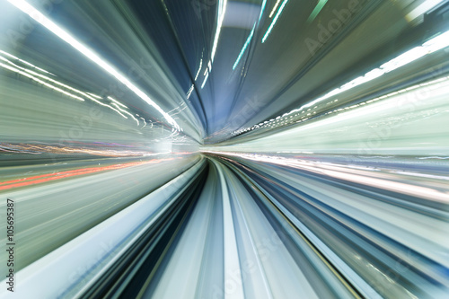 Subway tunnel with Motion blur of a city from inside © leungchopan