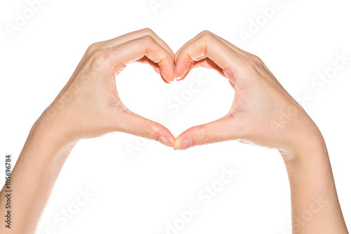 Female hands in the form of heart isolated on white background © exzozis