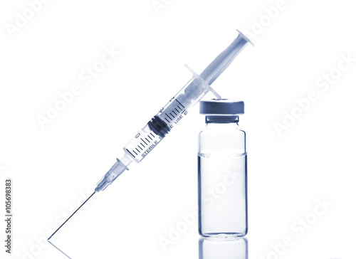 Glass Medicine Vial and Syringe on white background