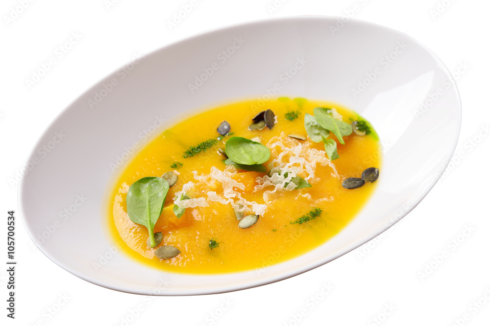 pumpkin cream soup with cheese, greens and pumpkin seeds, isolat pumpkin cream soup with cheese, greens and pumpkin seeds, isolat