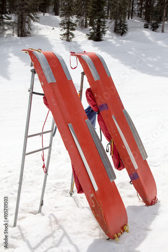 Two emergency rescue sleds at a ski resort photo