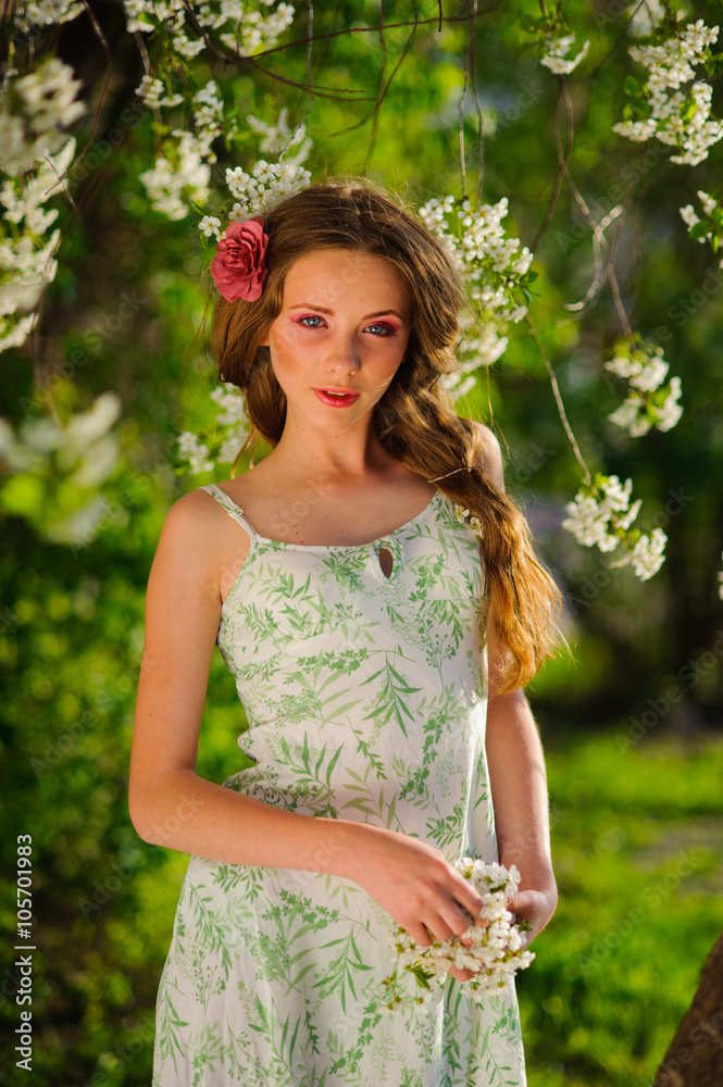 beautiful woman in a spring garden beautiful woman in a spring garden